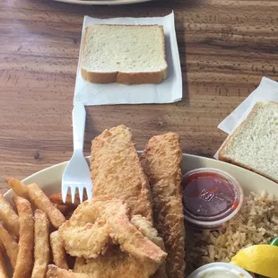 2 fish &amp; 2 shrimp combo !! plate in the back has the same plus 2 chicken tenders.