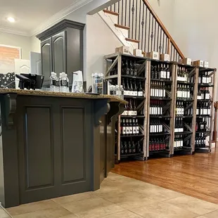 a wine shop with a wine rack