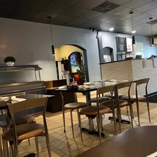  dining area with tables and chairs