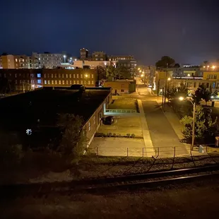 View of railroad and parking structure on lower left from the toom