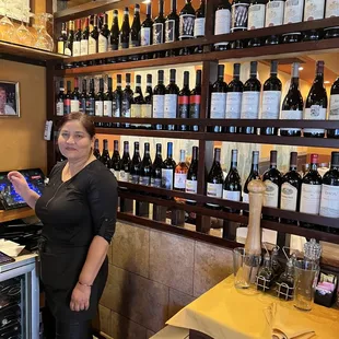 a woman in a wine shop