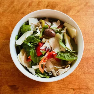 Signature Salad: roast chicken, mixed greens, tomatoes, roasted peppers, artichokes, olives &amp; fresh mozzarella with creamy garlic &amp; herb