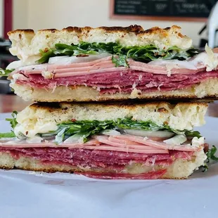 Go with the weekly special, a family favorite or build your own. Salami, mortadella, arugula, herb mayo and giardiniera