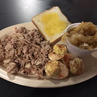 BBQ pulled pork , Texas toast with my choice of two sides, deviled eggs and cooked cabbage