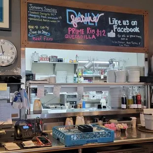 a view of the counter area of a restaurant