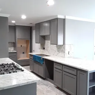 Latex painted cabinets, with satin finish.