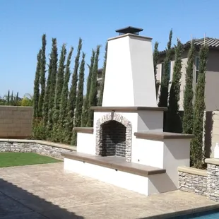 Outdoor fireplace painted with Sherwin Williams exterior Super Paint.