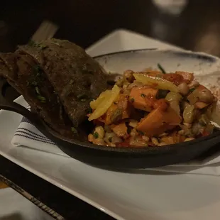 Casablancan style sweet potato tagine:  chickpeas, green olives, almonds, oranges, harissa, preserves lemon yogurt, and buckwheat flatbread.