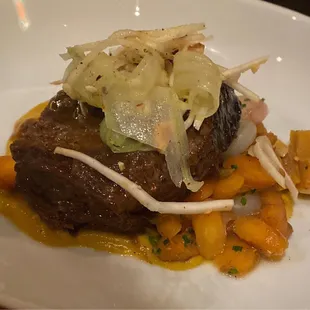 Cider braised Piedmontese short rib, spiced carrot purée, roasted fall vegetables, hazelnut and apple gremolota