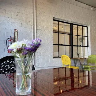 a vase of flowers on a table