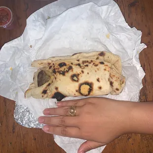 Egg, sausage, potato, cheese "taco" but more like a burrito