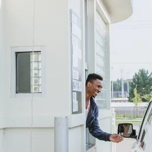 a man opening a car door
