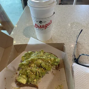 Avocado toast on warm gluten free bread and a coffee
