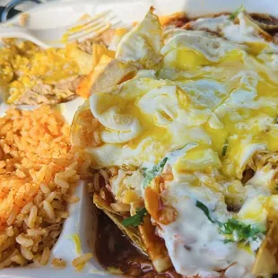 Red sauce Chilaquiles Plate with the over easy eggs. Perfect with that runny yoke. Delicious.