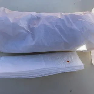 ws a sandwich wrapped in tissue paper