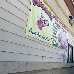 a sign on the side of a building