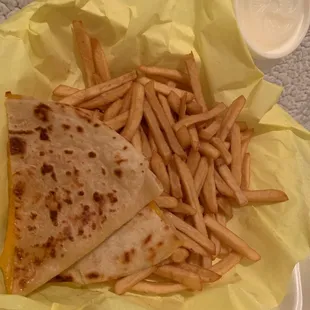 Fries look like they have been there for hours and this is the $8 quesadilla lol.