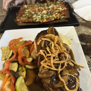 Our food arrived! Meatloaf and pizza