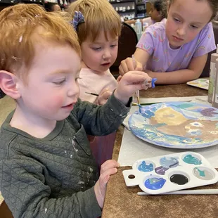 Kiddos doing what they do best.