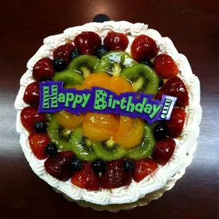 8" layered cake with assorted fruits