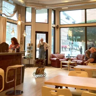 a group of people sitting at tables