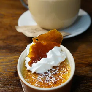 a cup of coffee and a dessert