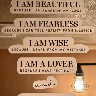 On the bathroom mirror in the unisex restroom