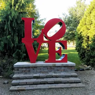 miniature recreation of Robert Indiana&apos;s LOVE sculpture