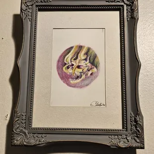Original art by Christine Skelly, resident artist.