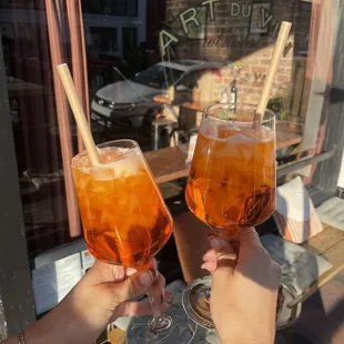 An "Aperol" Spritz is the best way to soak in the sun on the patio!