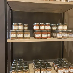 Assorted flavored sugars, salts and steak rubs.