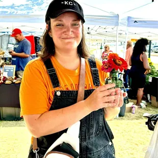 Customer who purchased fresh zinnias from vendor, Black Farmer Jane