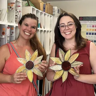 Customers displaying their wonderfully made stained glass sunflowers