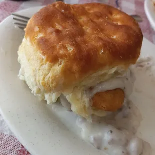 The &apos;Clucker&apos;- delicious fried chicken with a little sausage gravy on one of the fresh home made bisquits.