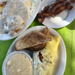 Biscuits and gravy, western omelette, cheesy grits and bacon!
