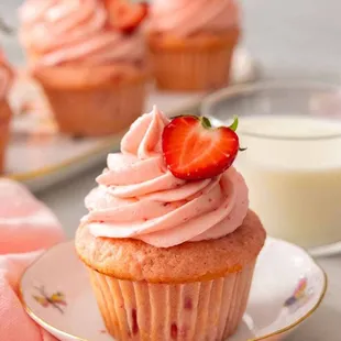 a strawberry cupcake on a plate