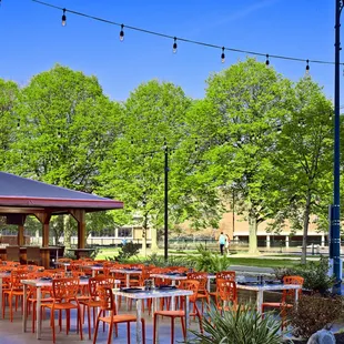 outdoor seating area with tables and chairs