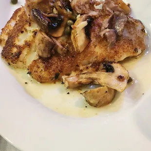 Sea Bass with mushroom and a lemon caper sauce