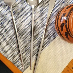 a table setting with utensils