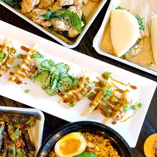 Popcorn chicken, potstickers, mala noodles, pork belly buns, edamame
