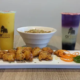 Glazed chicken, applewood bacon fried rice, mango, butterfly pea