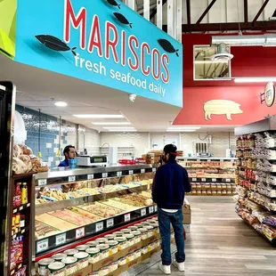man in a grocery store