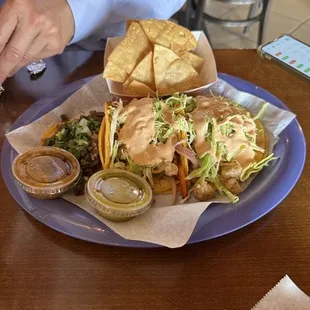 Awesome fish tacos and 1 steak taco.
