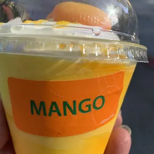 Mango gelatin. Mango gummy on top