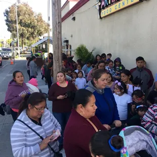 a large group of people standing outside