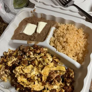 Chorizo, beans and rice. Chorizo is good and made in house.