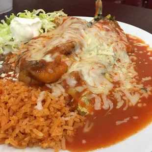 Closeup chile rellenos, refried beans, rice &amp; salad!