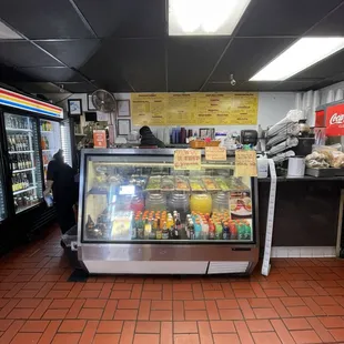 Walk-up counter showing beverages, menu and where you order