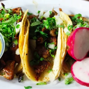 Birra tacos (goat version super authentic), pastor taco, and tripa taco.
