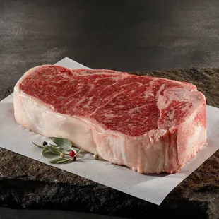 a piece of beef on a rock